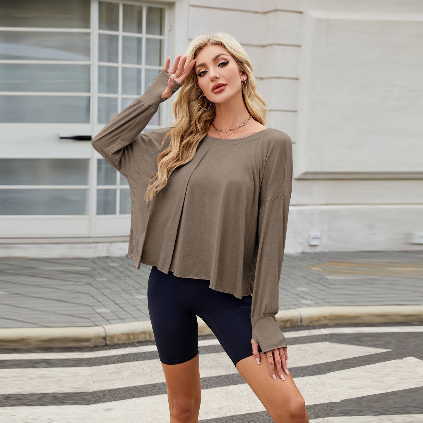 Long sleeve solid color loose back cut-out top
