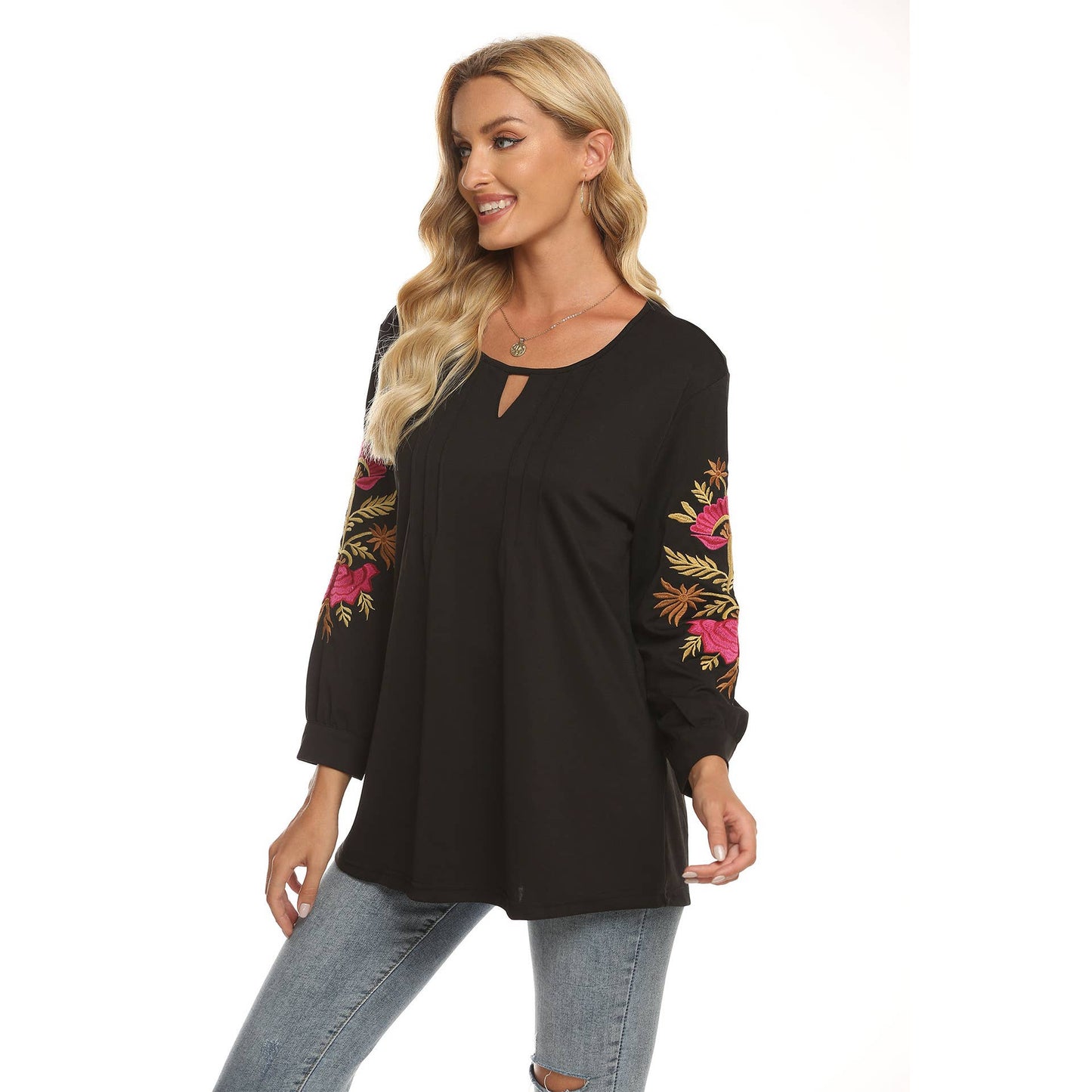 Three-dimensional flower-embroidered top