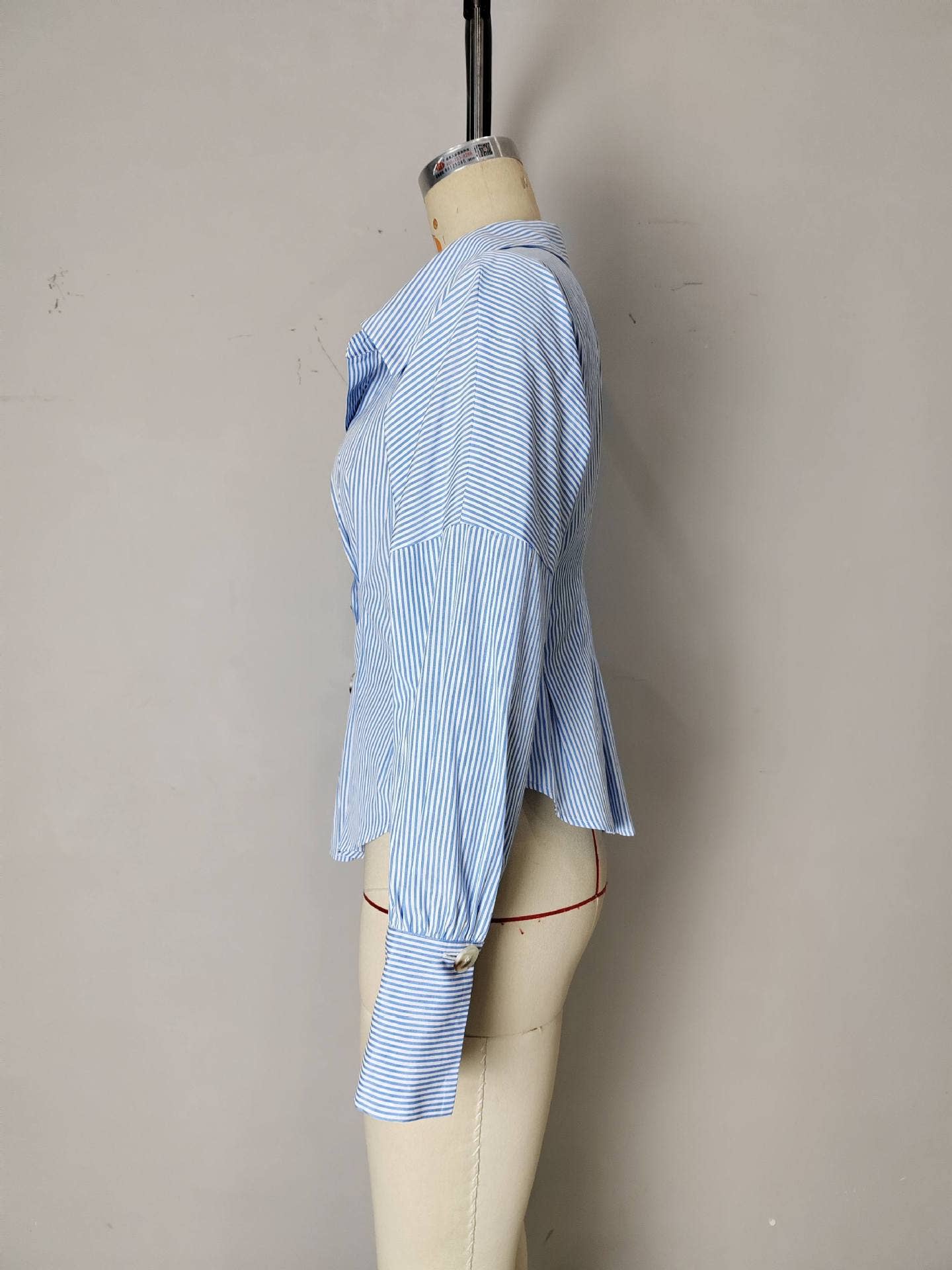 Lapel puffed sleeve pleated and cinched shirt