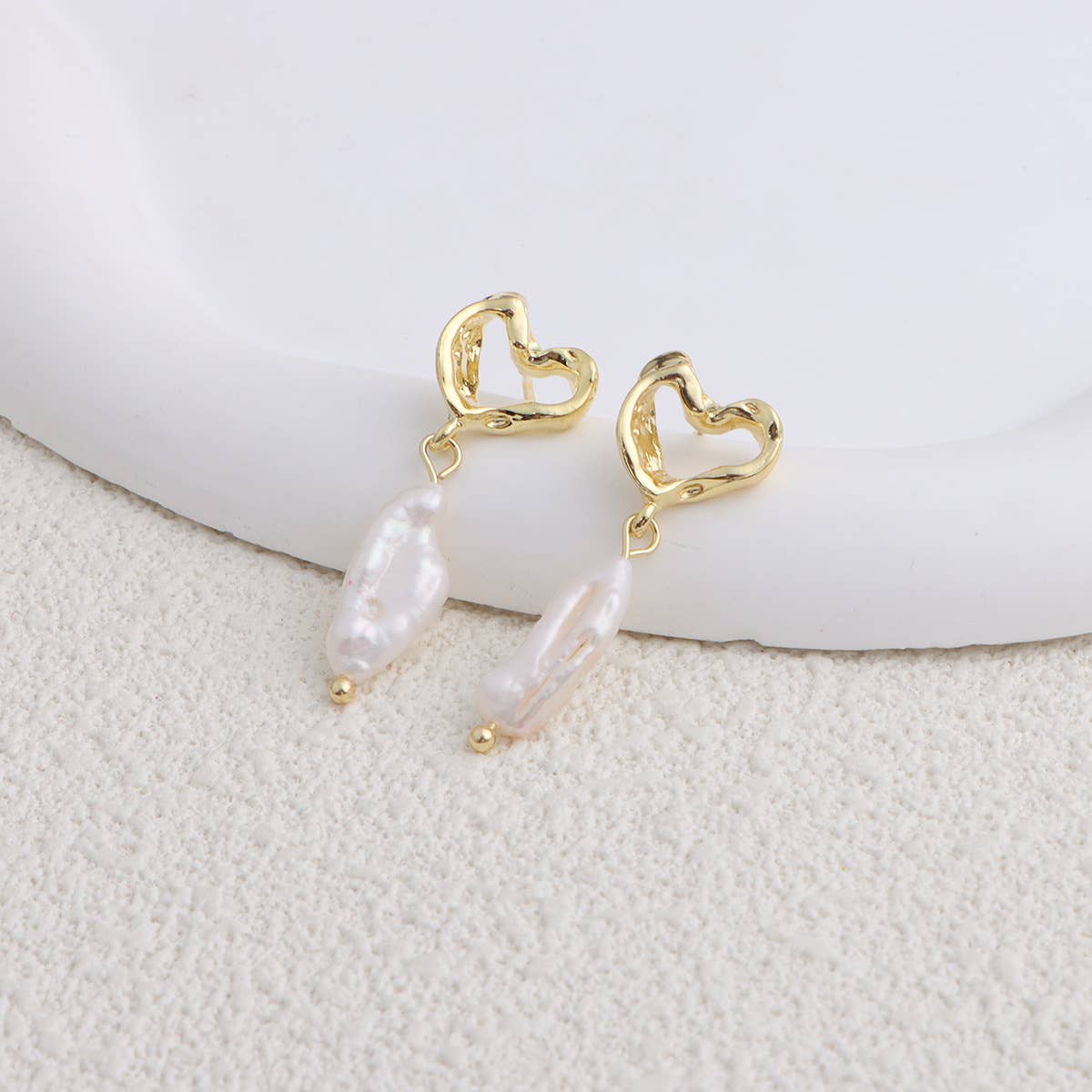 Trendy metal bow freshwater pearl earrings