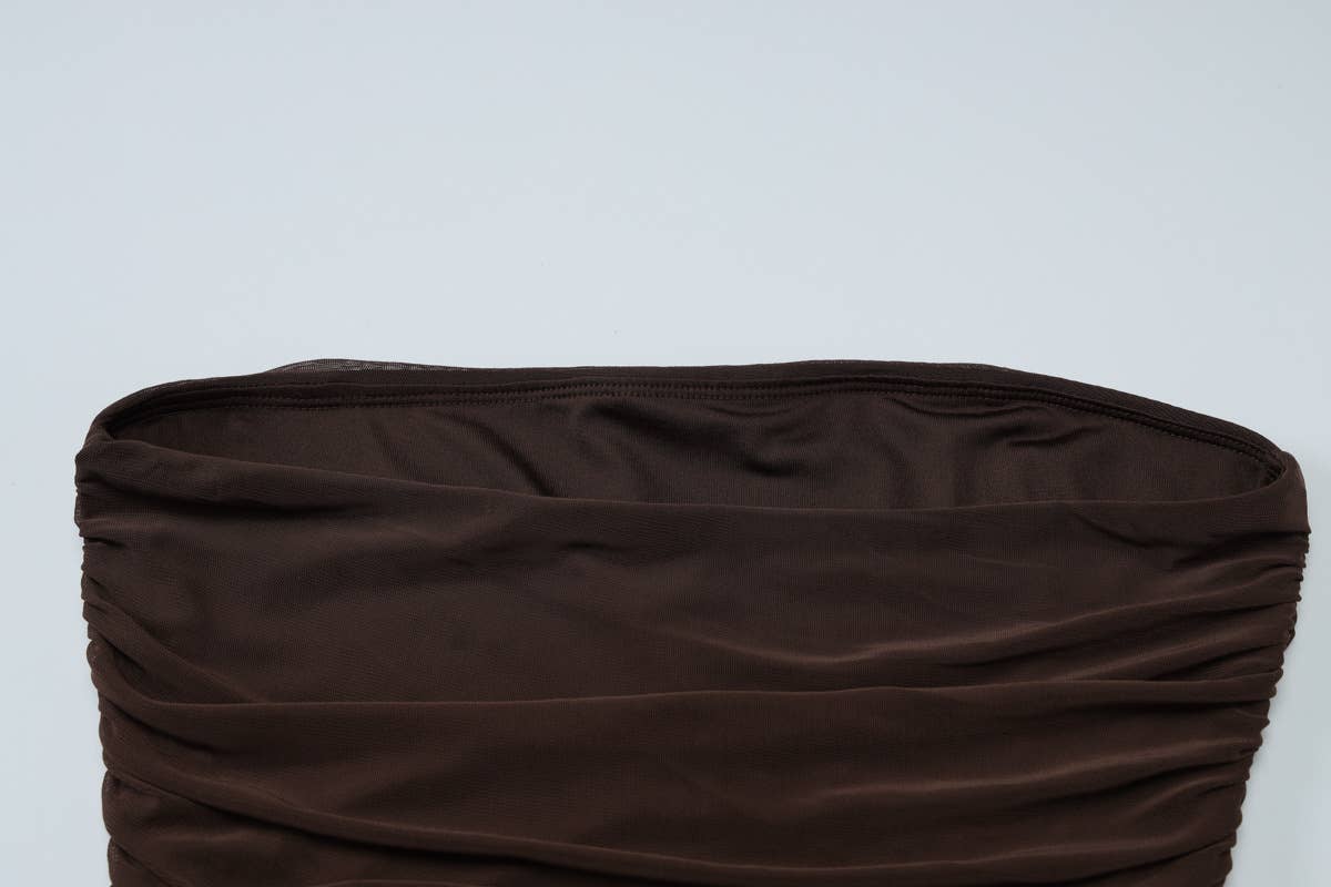 A strapless pleated patchwork gauze dress