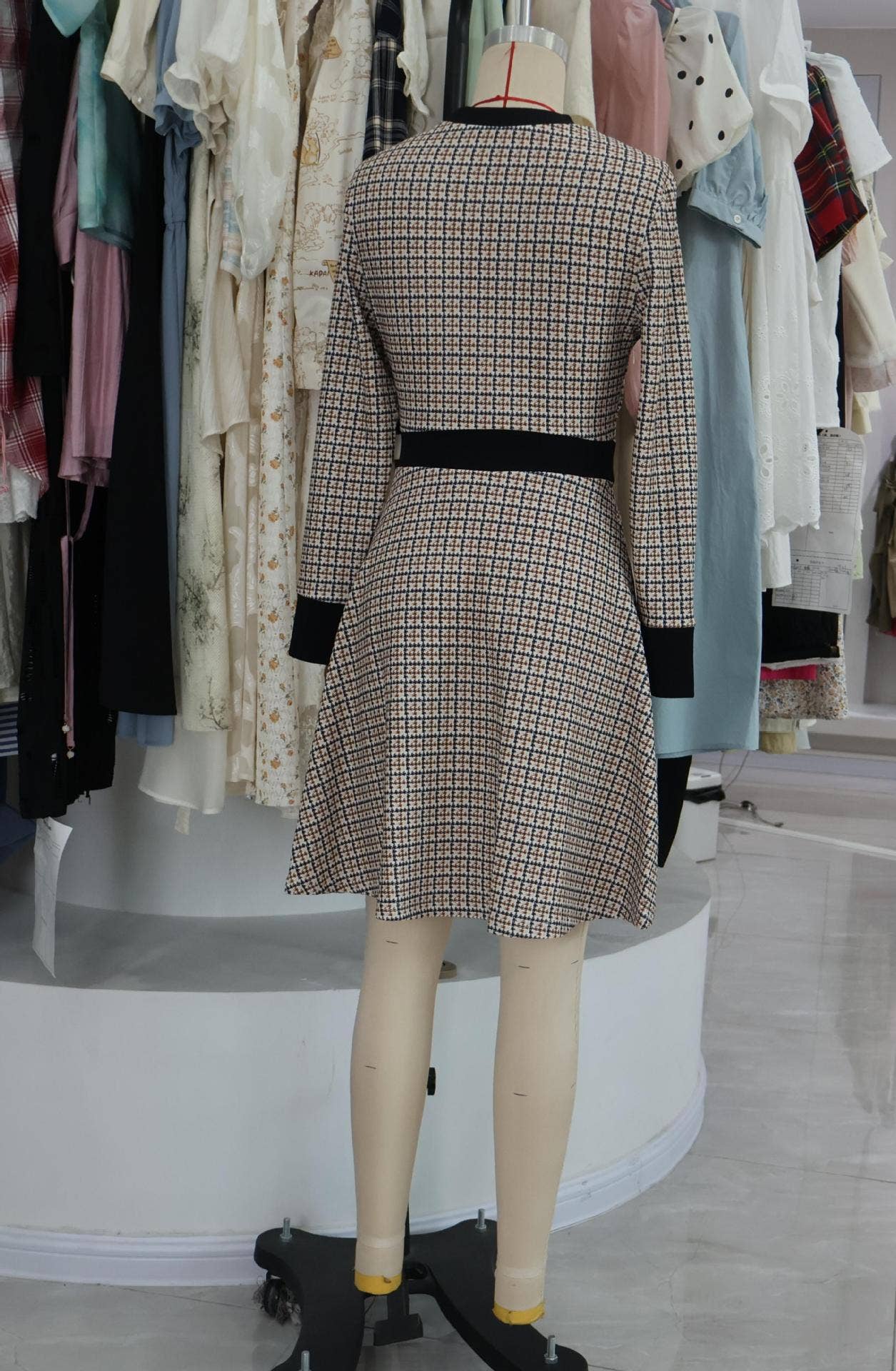 Long-sleeved knitted checkered button-down dress