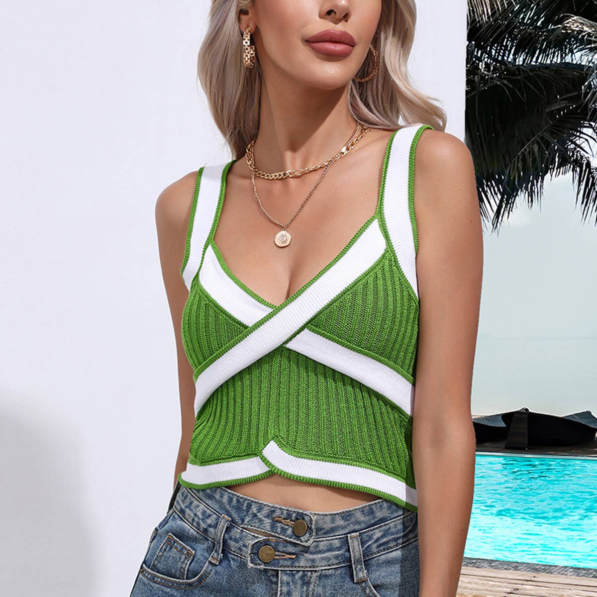 SLEEVELESS V-NECK SWEATER WITH CROSS HALTER