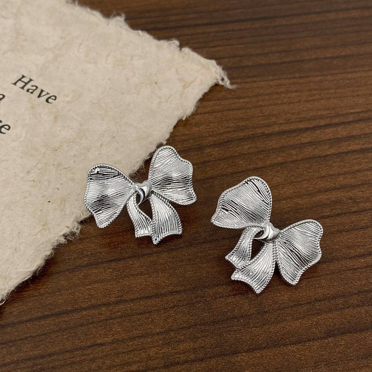 NEW SIMPLE TEMPERAMENT BOW EARRINGS FOR WOMEN