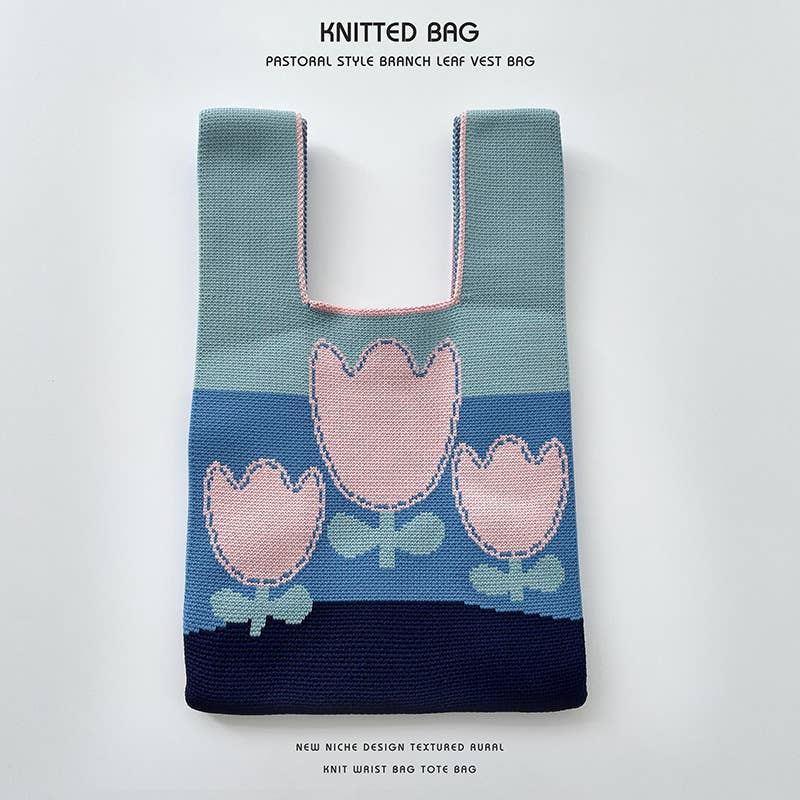 Heart-shaped color-blocked knitted handbag