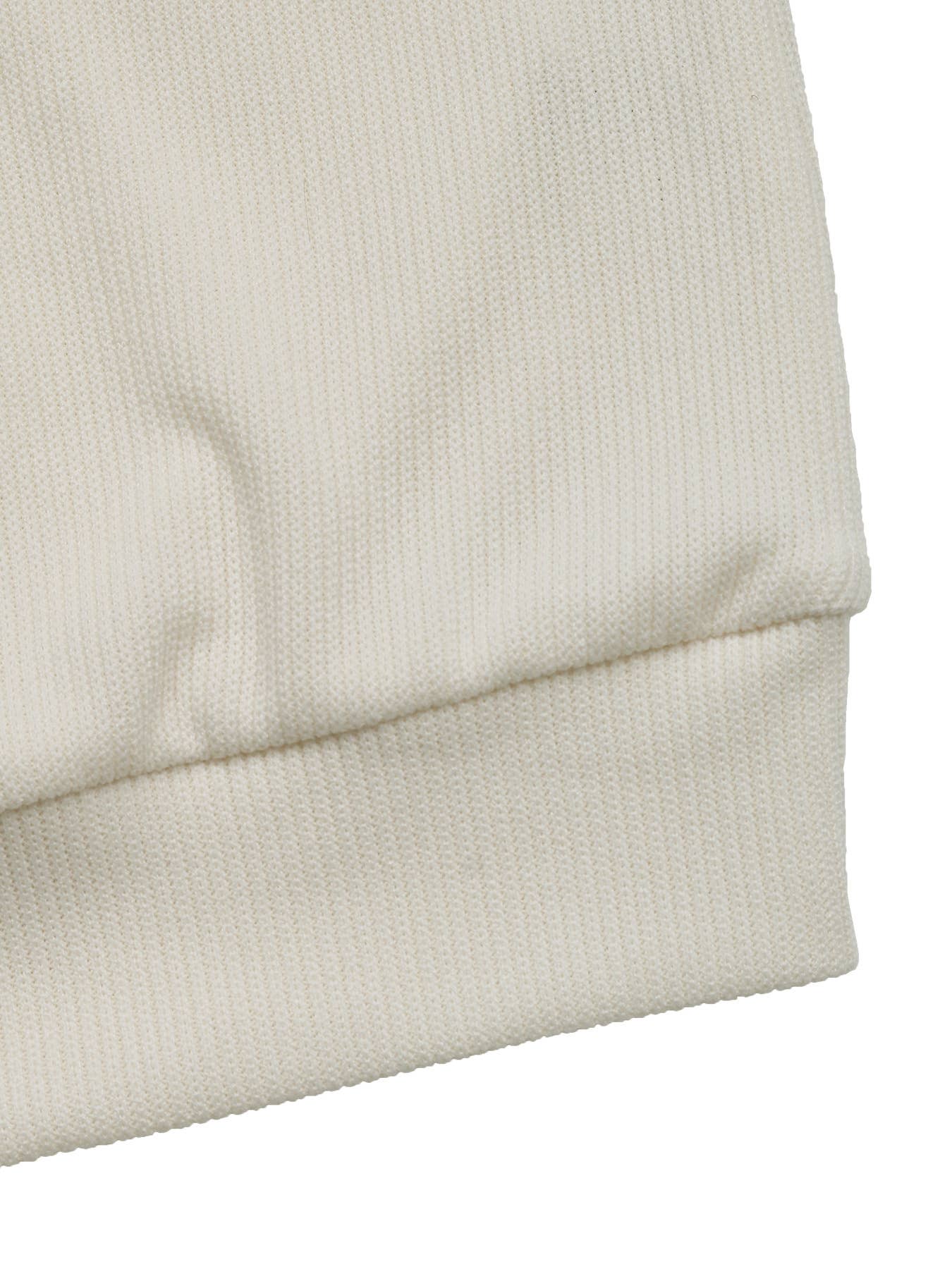 Textured embroidered patchwork top