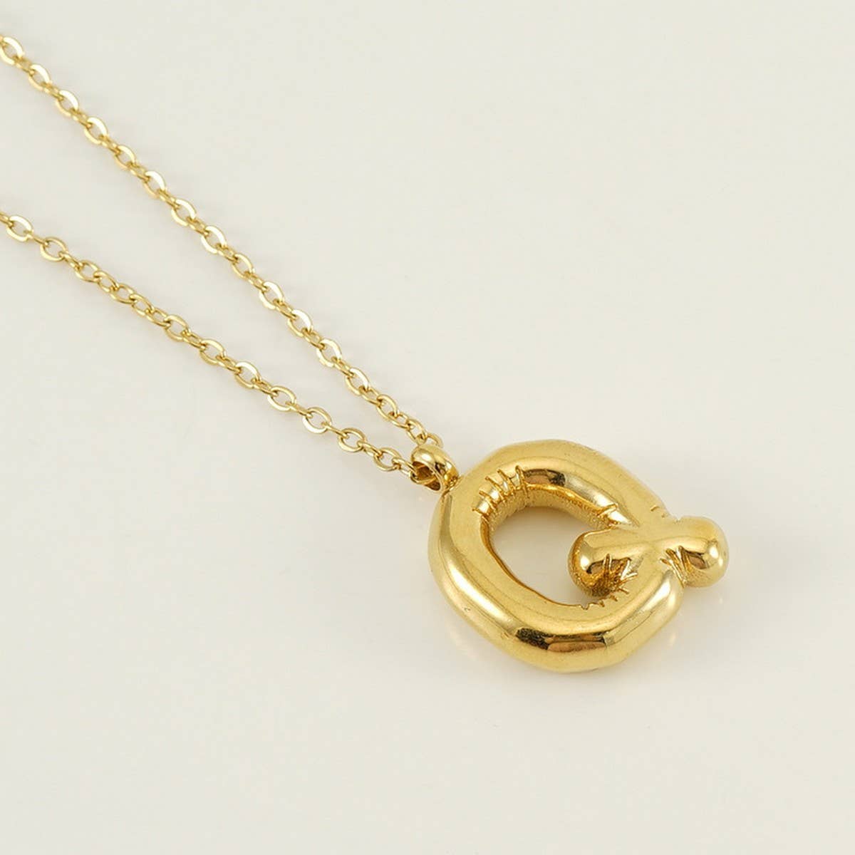 CWAJE1933_Stainless Steel Glossy Bubble Letter Necklace Gold