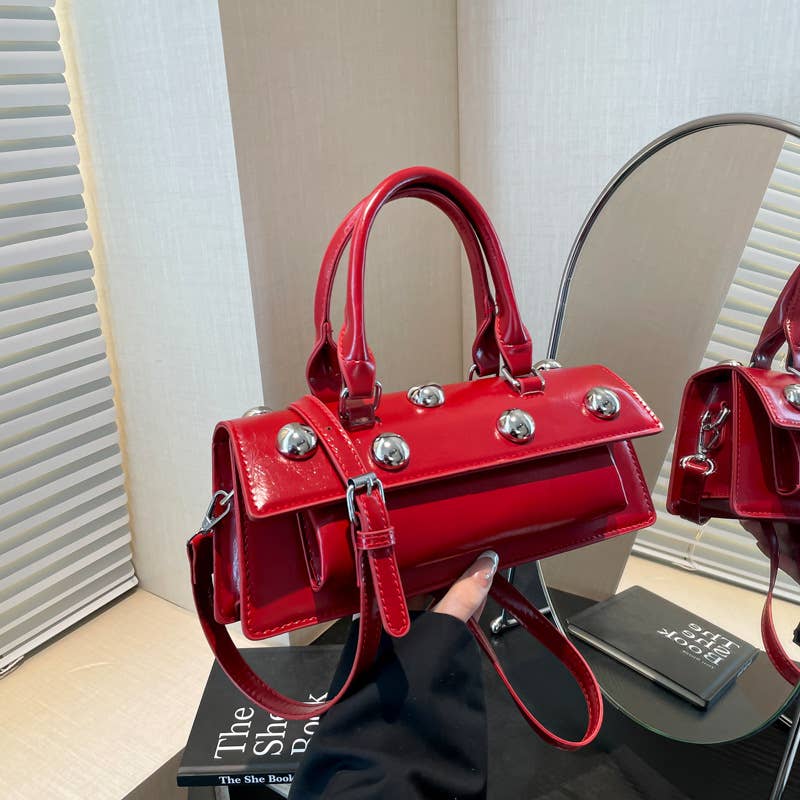 Fashionable rivet personalized hand-held tote bag