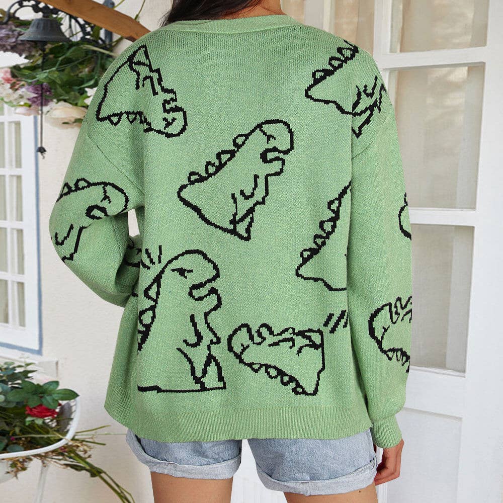 THE JACKET IS A LOOSE CARTOON DINOSAUR CARDIGAN