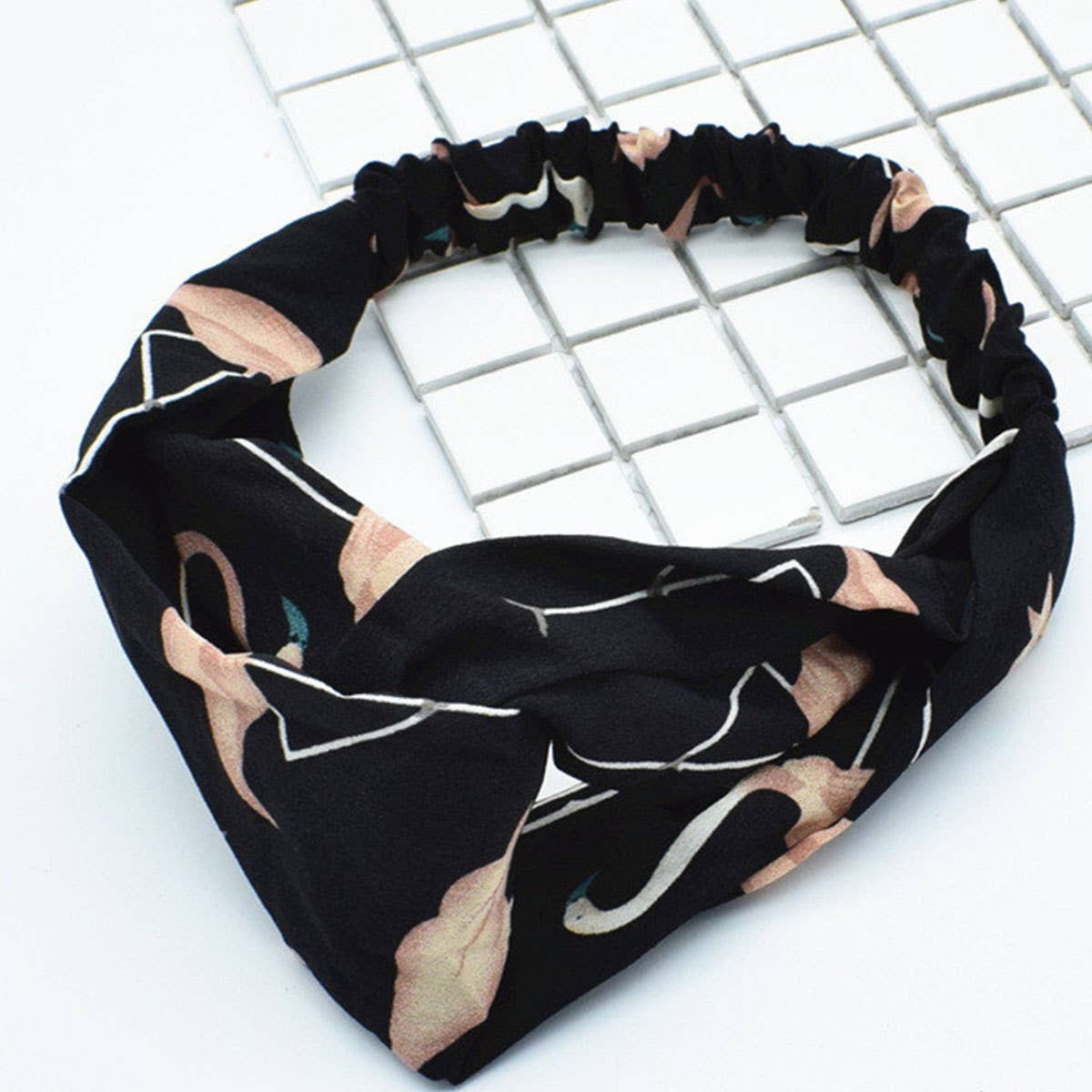 Silk hair band with interlaced patterns