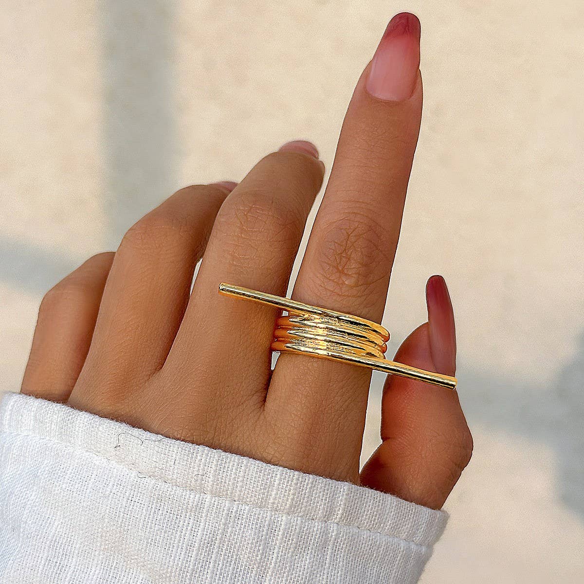 SIMPLE ASYMMETRICAL STATEMENT FRENCH RING