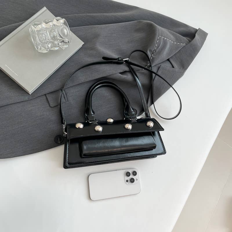 Fashionable rivet personalized hand-held tote bag