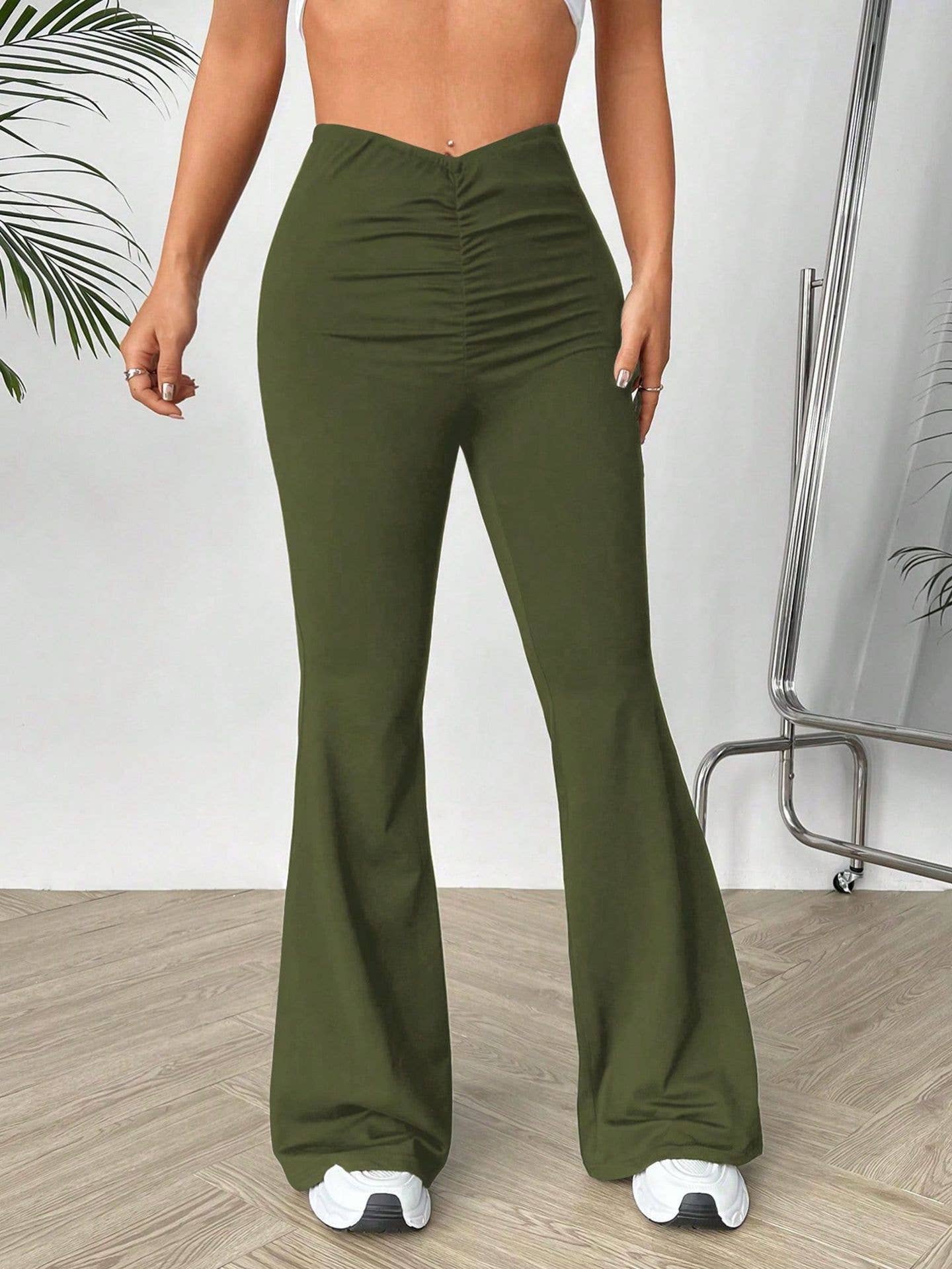 V-shaped waist slimming slightly flared trousers