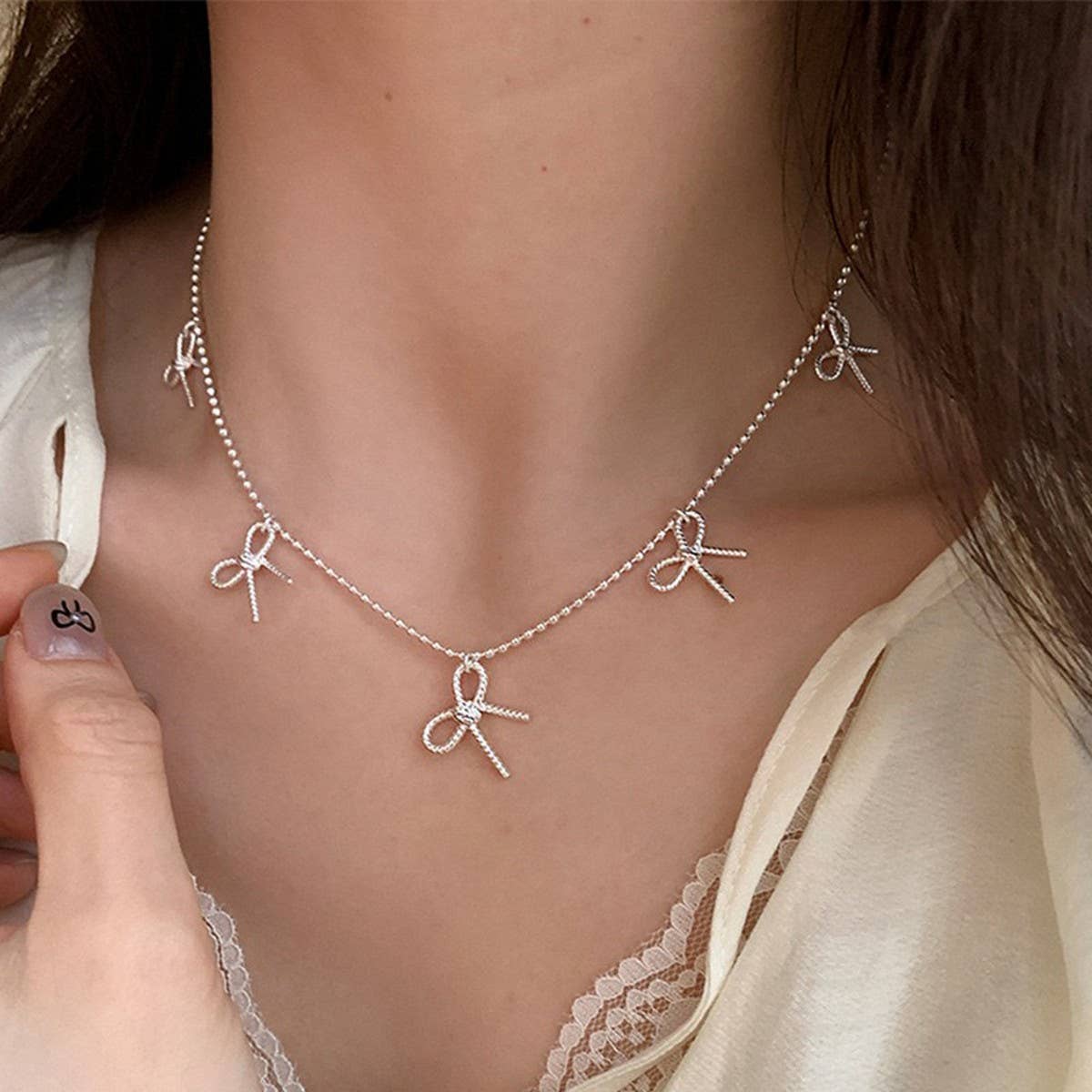 WOMEN'S TEMPERAMENT METAL BOW TASSEL NECKLACE