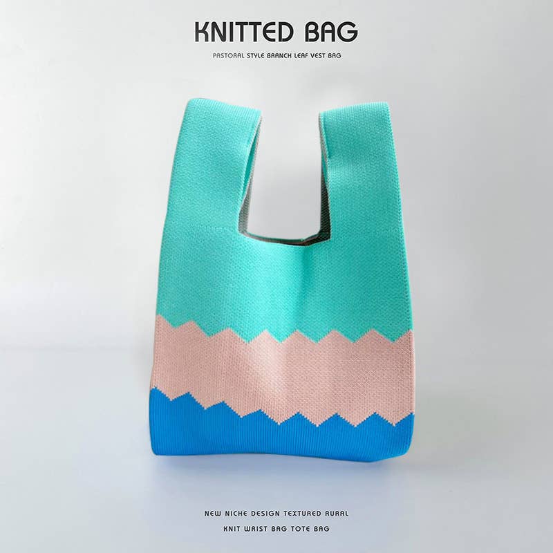 Heart-shaped color-blocked knitted handbag