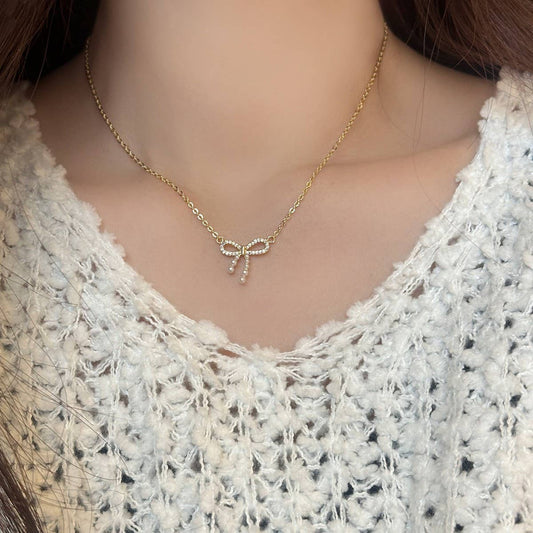 MICRO-PAVED ZIRCONIA PEARL BOW PENDANT NECKLACE