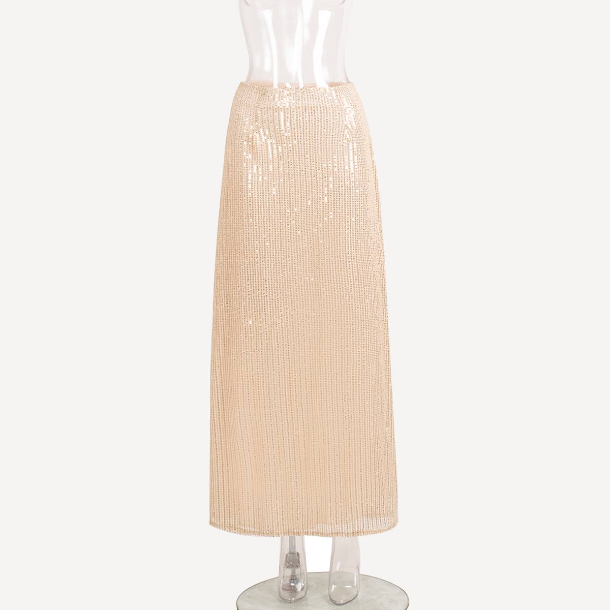 A long straight skirt in golden thread sequins