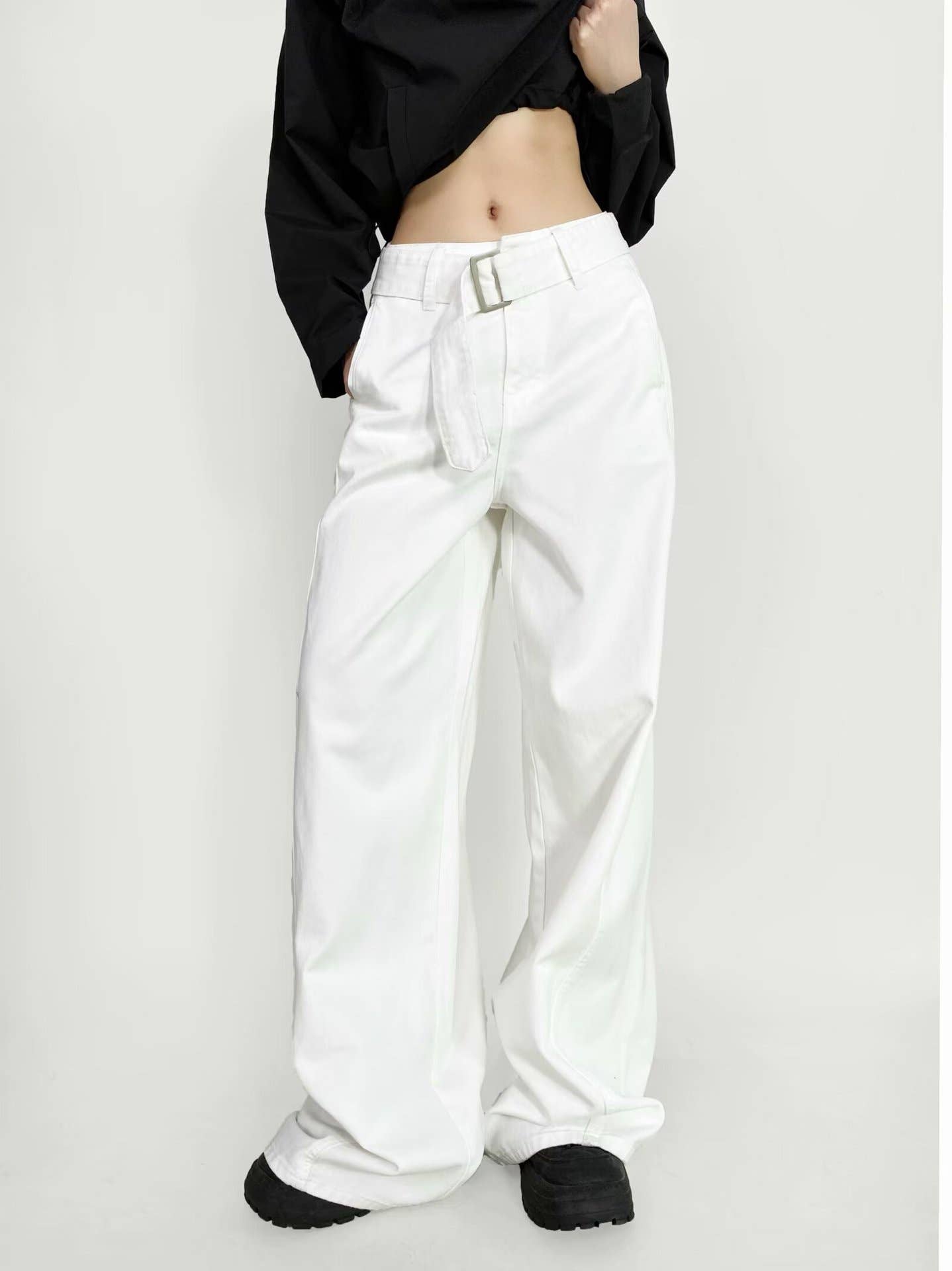 High street girls pair wide-leg jeans with belts