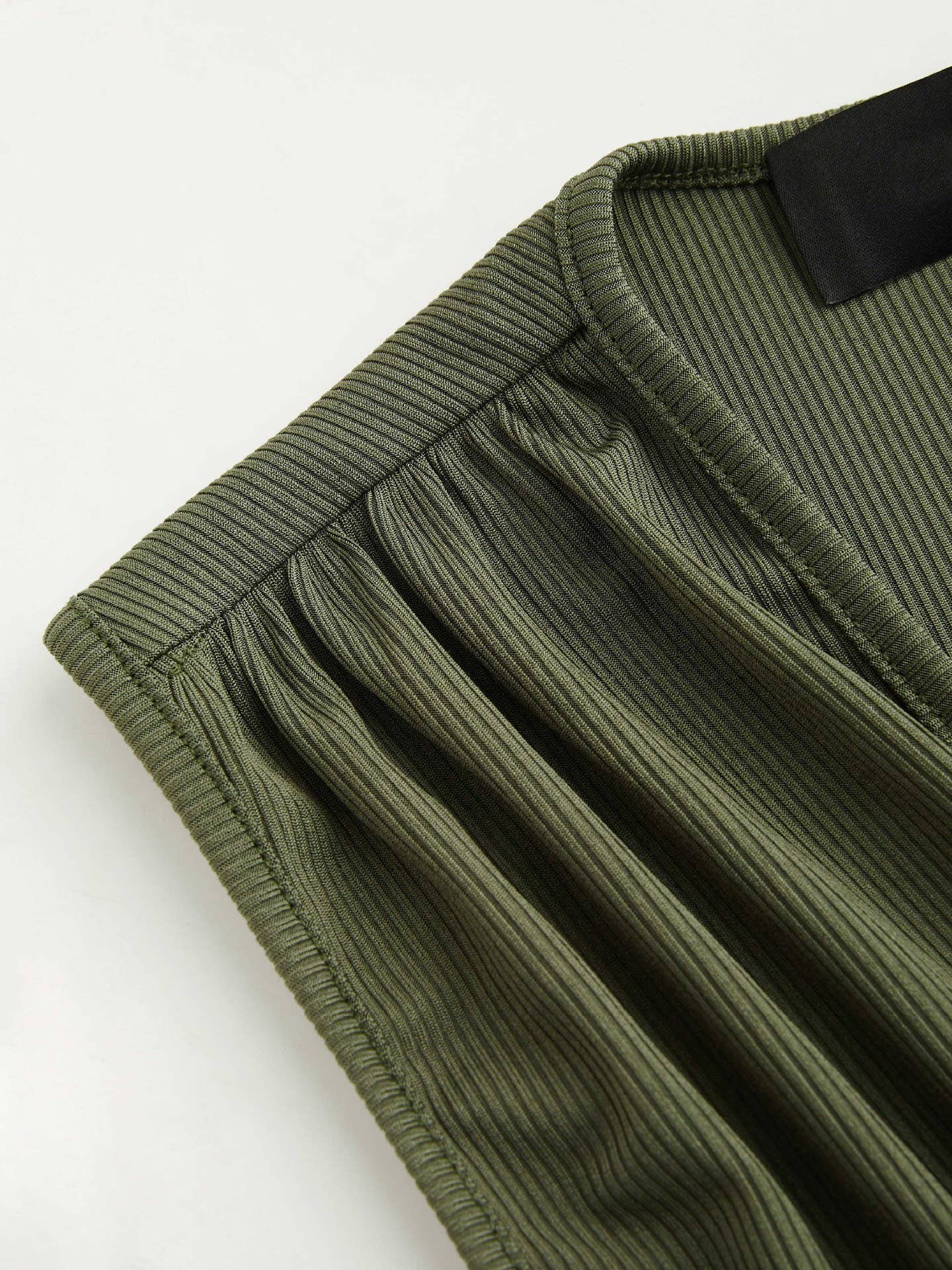 KNITTED PLEATED PIT STRIP SLEEVELESS ONESIE