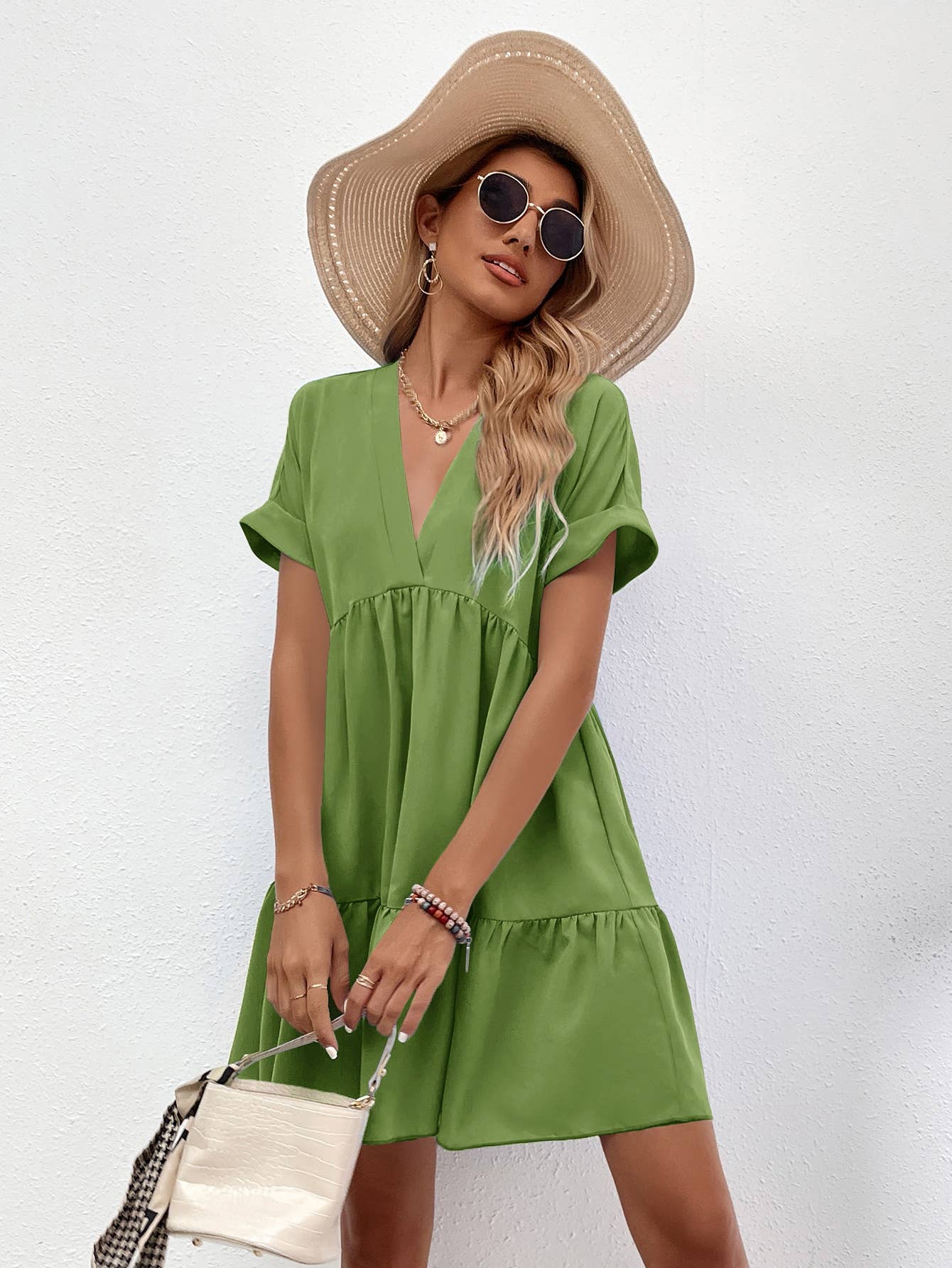 A casual, loose V-neck, large-hem short dress