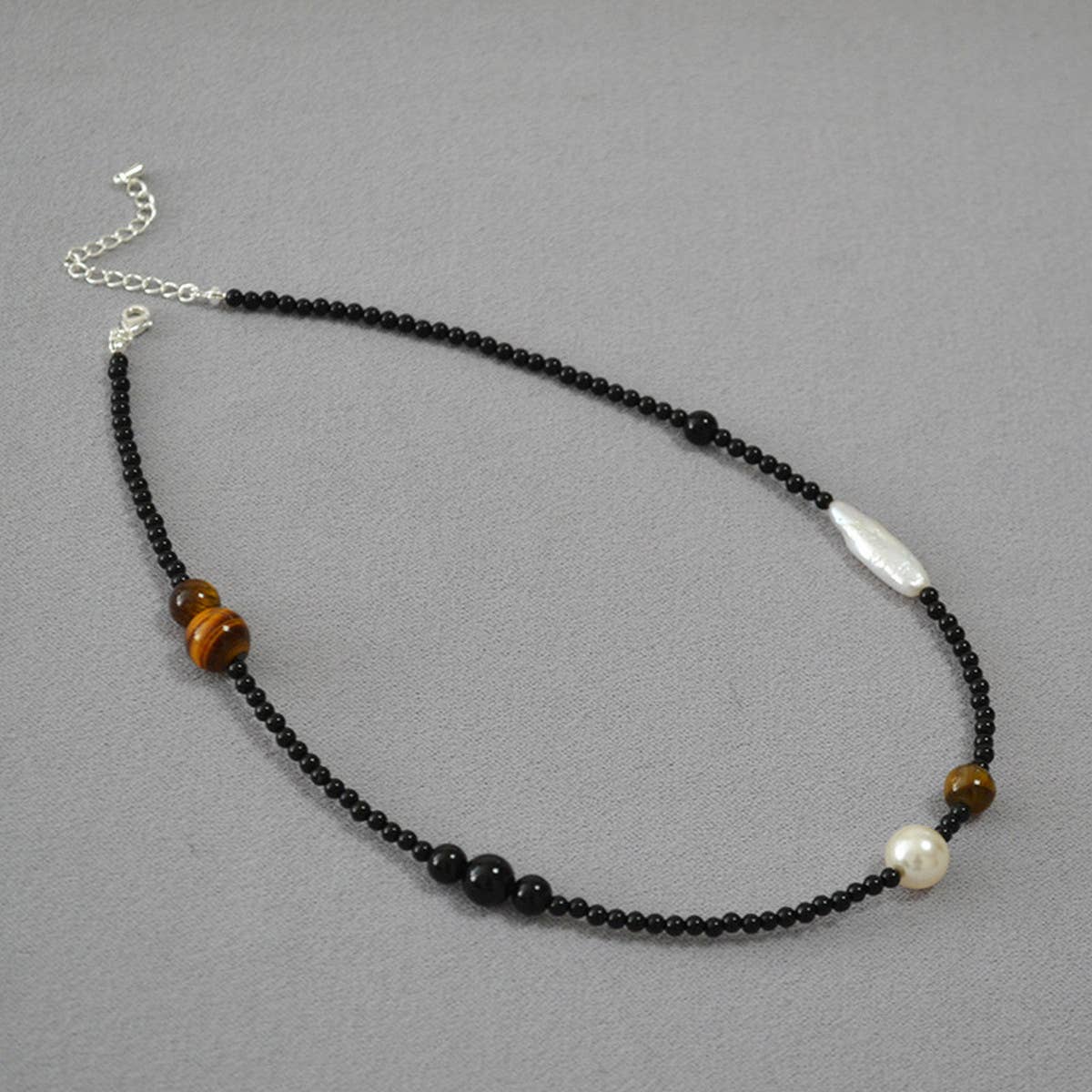 VINTAGE STITCHING ASYMMETRICAL BEADED NECKLACE