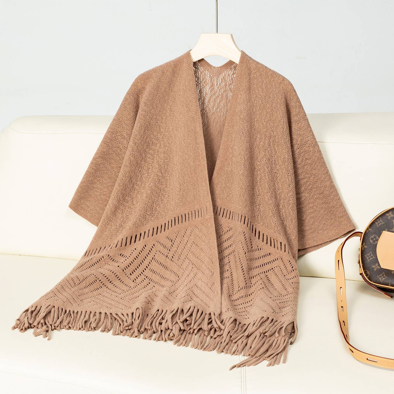 Solid colour hollow knit tassel cape cape