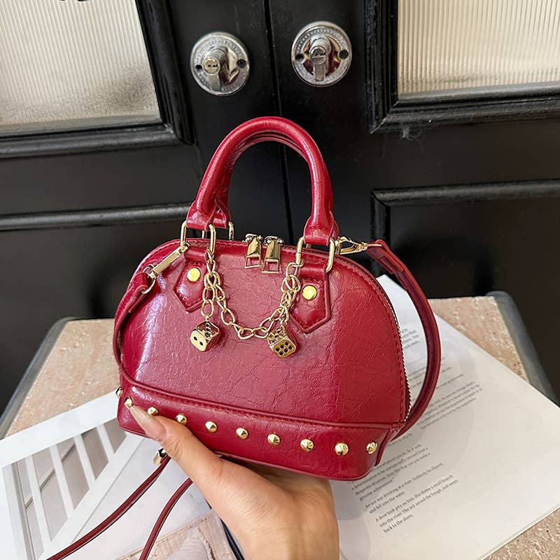 Fashionable riveted single-shoulder bag